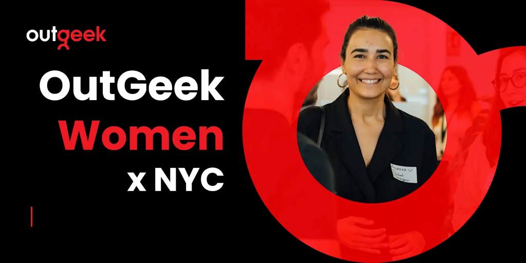 Tech industry women exchanging contact information and business cards at the OutGeekWomen June mixer in New York City